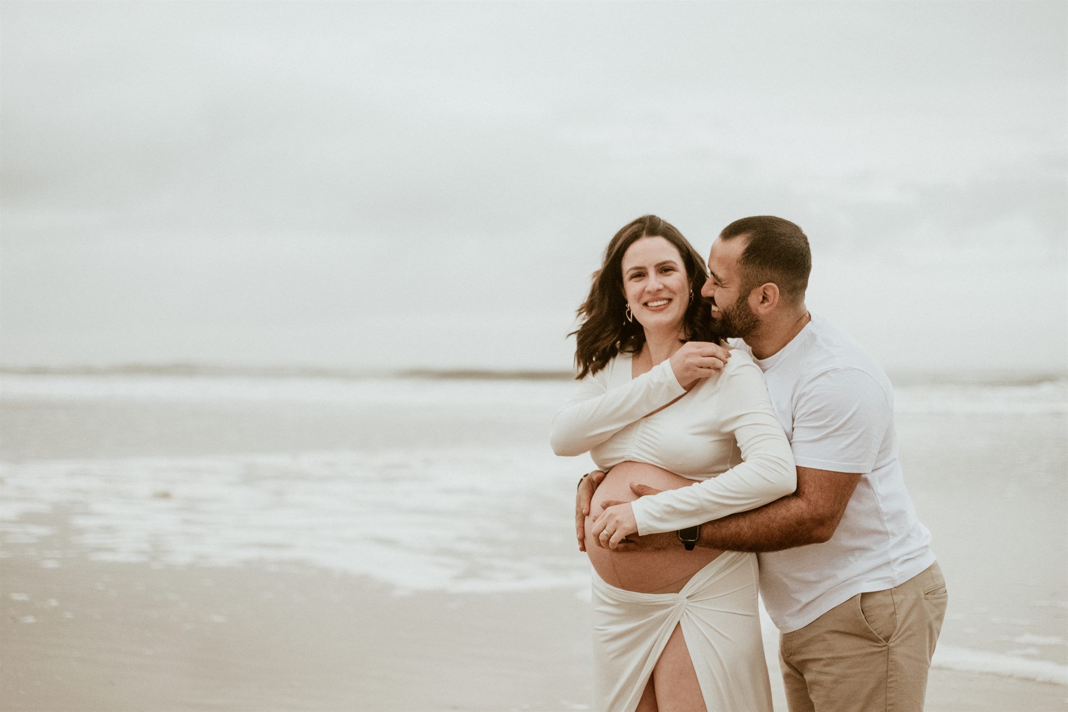 NOKAT art a quieter maternity portrait held against the shoreline and wind..